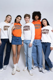 Five people wearing Anderson University merch and denim on a plain background